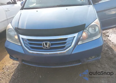 2010 Honda Odyssey Ex-L from USA, damaged, VIN 5FNRL3H79AB052697